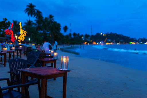 How can you enjoy the nightlife in Goa