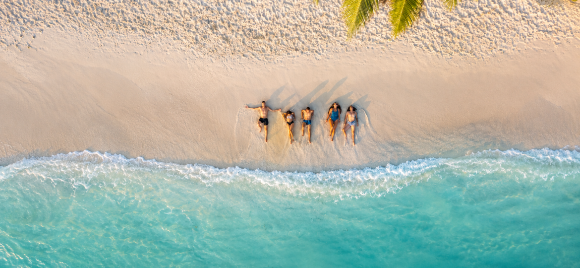 Bunch of friends on beach top shot